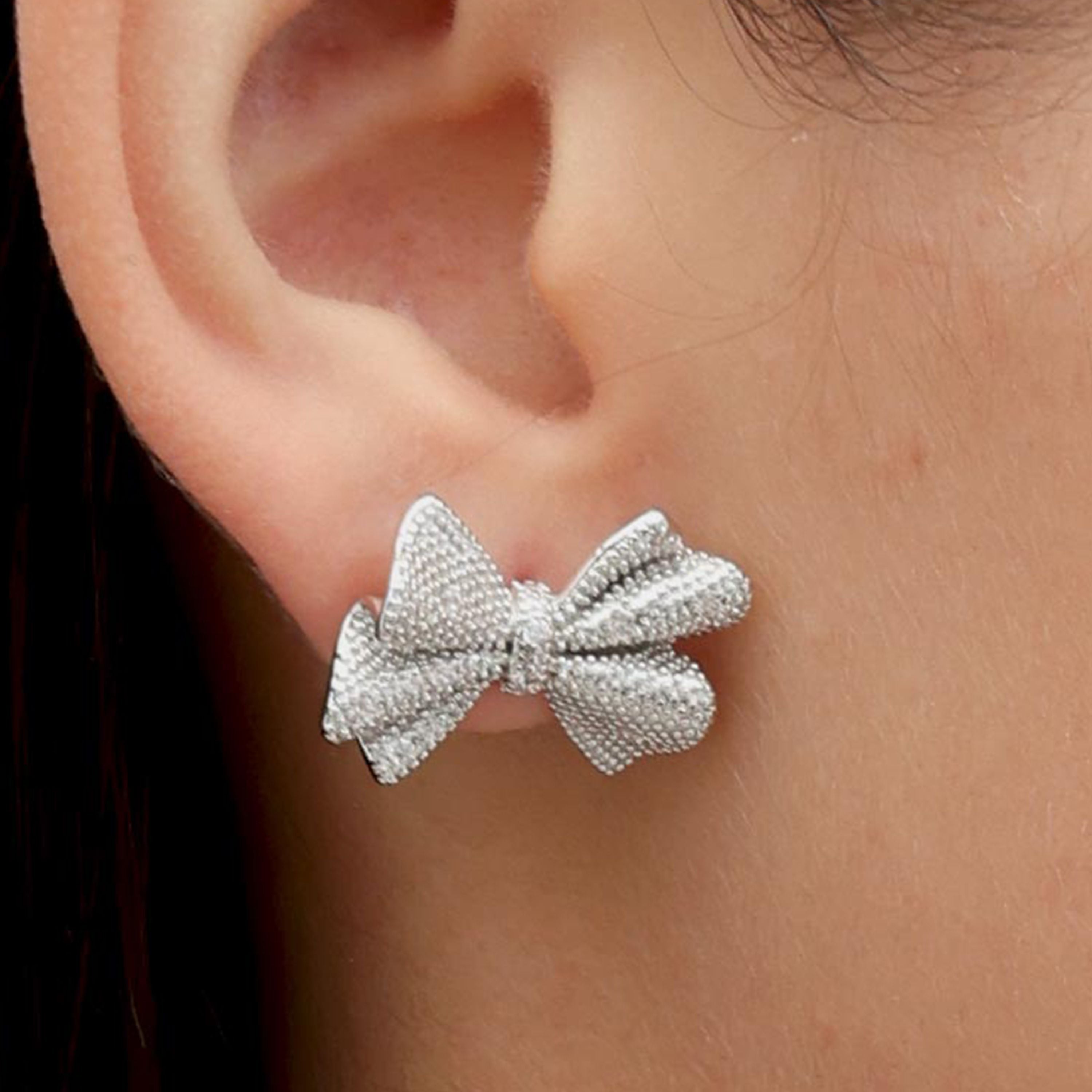 RSNY shiny bow stud earrings